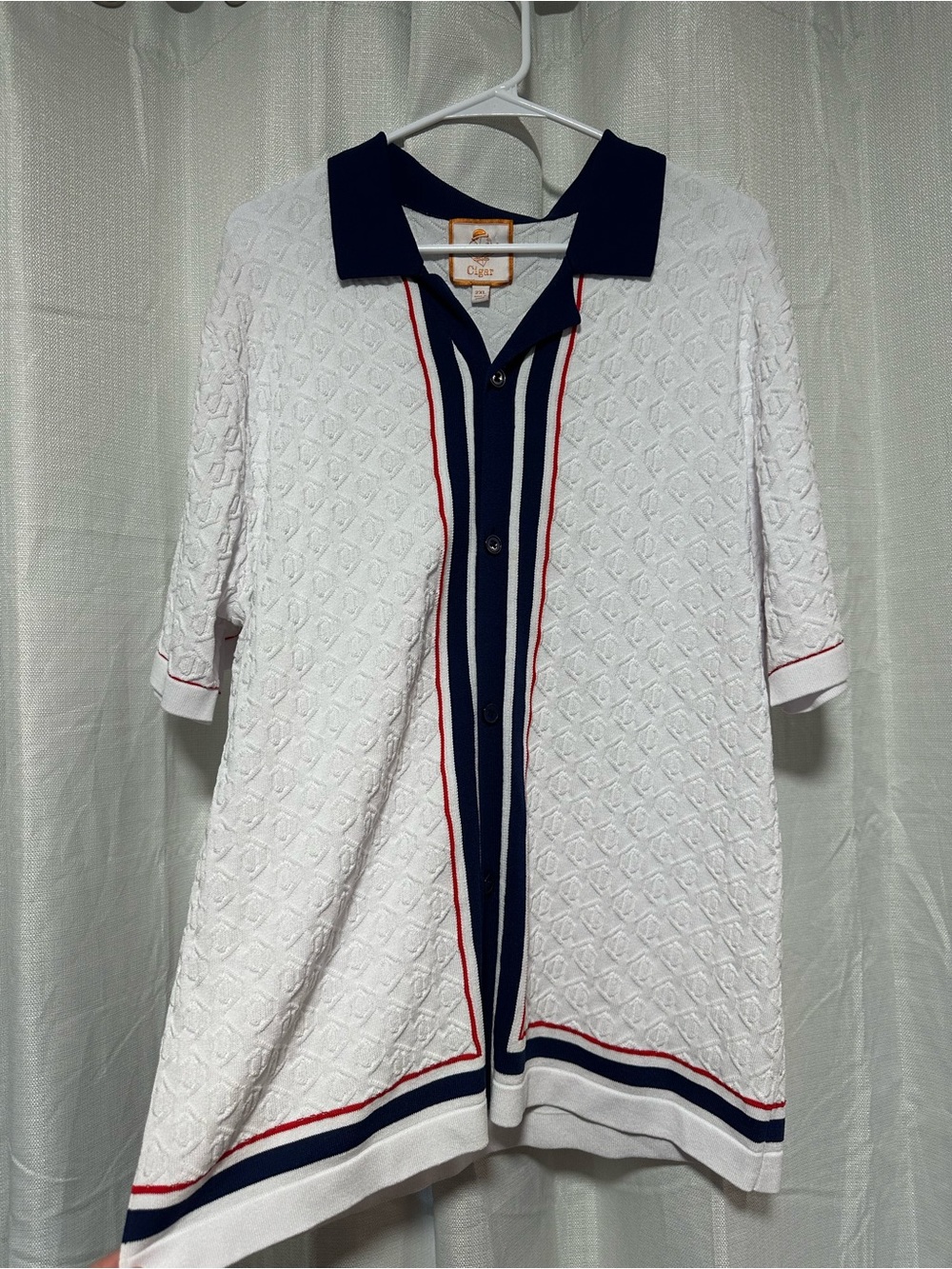 White Knit Polo with Navy Collar and Red Stripe Accents